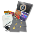 Forge Your Future kit by Grow Disrupt with guidebook, Reflect journal, Smoke & Bloom tea, Focus & Energize coffee, five numbered daily envelopes, forge stone, and pen.